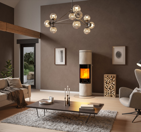 JUNO 166 L in Naturstein Porto und Vollglas-Feuerraumtür Holz-Kaminofen JUNO 166 L in Naturstein Porto und Vollglas-Feuerraumtür in grossem Wohnzimmer in Erdfarben